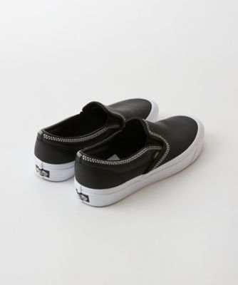 Vans black and outlet white classic slip on