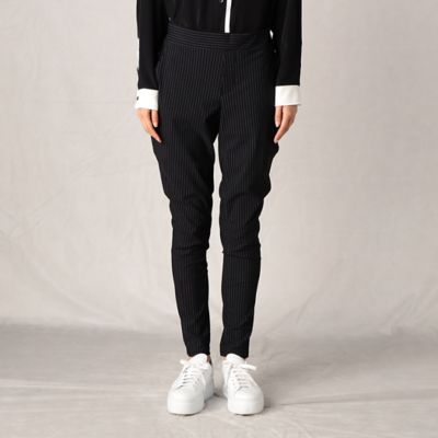 Homme Plissé Issey Miyake Pleated trousers by Issey Miyake