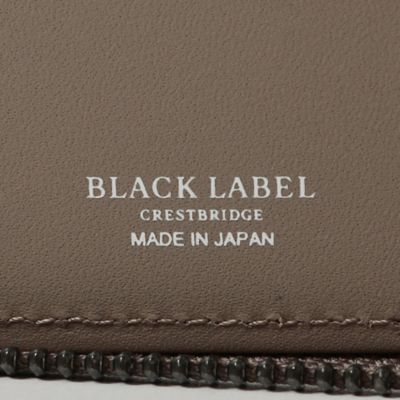 エンボスレザークレストブリッジチェックラウンドジップウォレット