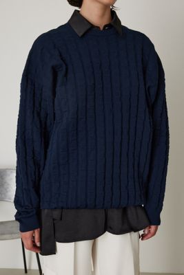 Uneven surface over knit