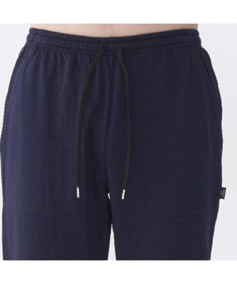 アンクルレッグテーパードパンツ