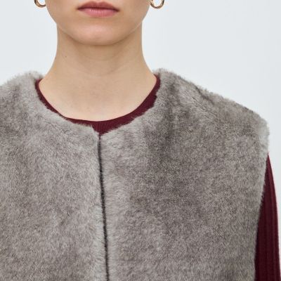 フェイクミンク ベルテッドジレ | maison TOMORROWLAND/メゾン