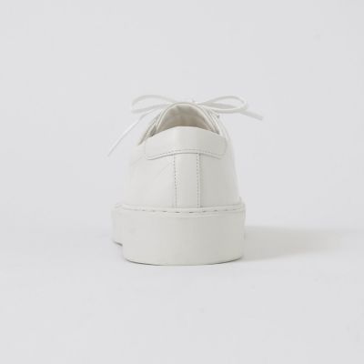 エンボスクレストブリッジチェックレザースニーカー | BLACK LABEL
