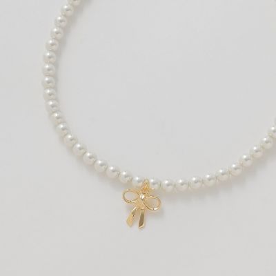 リボンモチーフパールネックレス | BLUE LABEL CRESTBRIDGE (Women