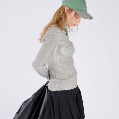 【美品】アニエス・ベー　7分丈　ブラック　パフスリーブ　ニット agnes b.（アニエスベー）の「LM42 PULL フェイスモチーフ アルパカ