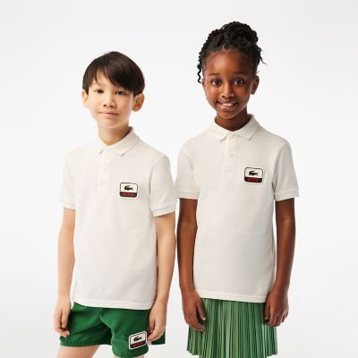 美品!　希少品　ラコステ　LACOSTE　ピーナッツコラボ　ルーシー　ポロシャツ LACOSTE × ピーナッツ コラボポロシャツ - メルカリ