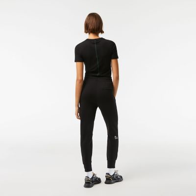 LACOSTE 幾何学模様 ブラックパンツ US L