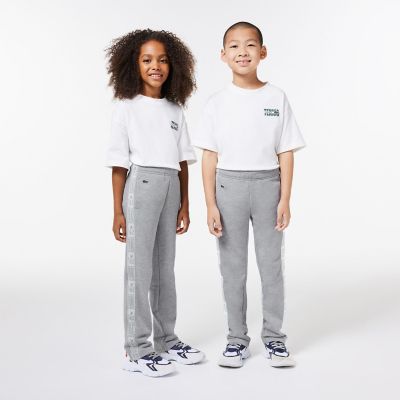 サイドテーピングJUNIORスウェットトラックパンツ | LACOSTE