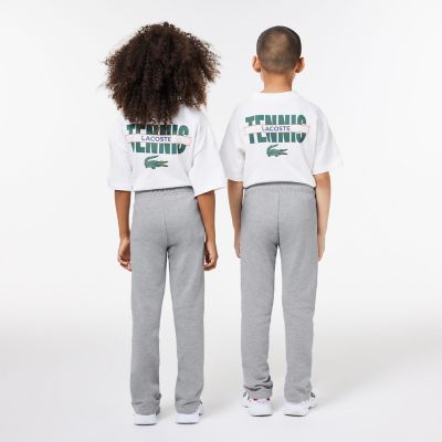 サイドテーピングJUNIORスウェットトラックパンツ | LACOSTE