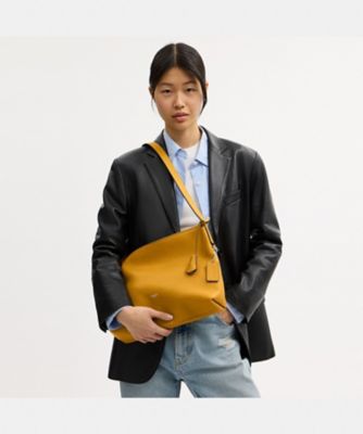 モット メッセンジャー バッグ 33 | COACH/コーチ | 三越伊勢丹 
