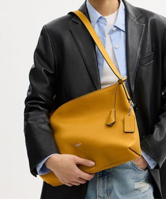 モット メッセンジャー バッグ 33 | COACH/コーチ | 三越伊勢丹 