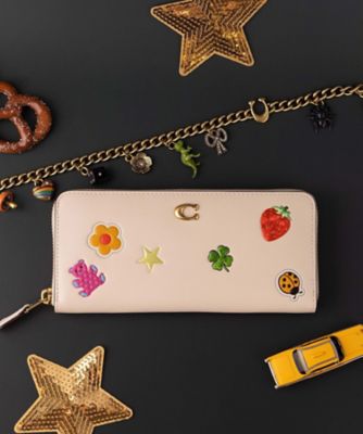 COACH/コーチ エッセンシャル スリム アコーディオン ジップ ウォレット・ステッカー プリント WHITE 財布・マネークリップ【三越伊勢丹/公式】