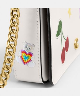 ミラ クロスボディ バッグ・ステッカー プリント | COACH/コーチ 