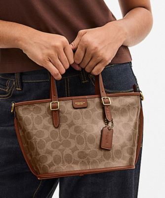 COACH/コーチ タクシー トート バッグ 21・シグネチャー キャンバス BEIGE 旅行用かばん・バッグ【三越伊勢丹/公式】