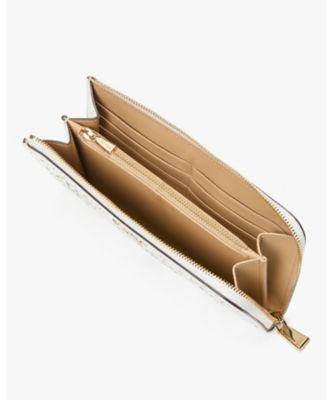 デヴィン スペード フラワー パーフォレーテッド ジップ アラウンド