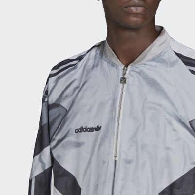 BLUEVERSIONハーフジップサッカートラックトップ | adidas 